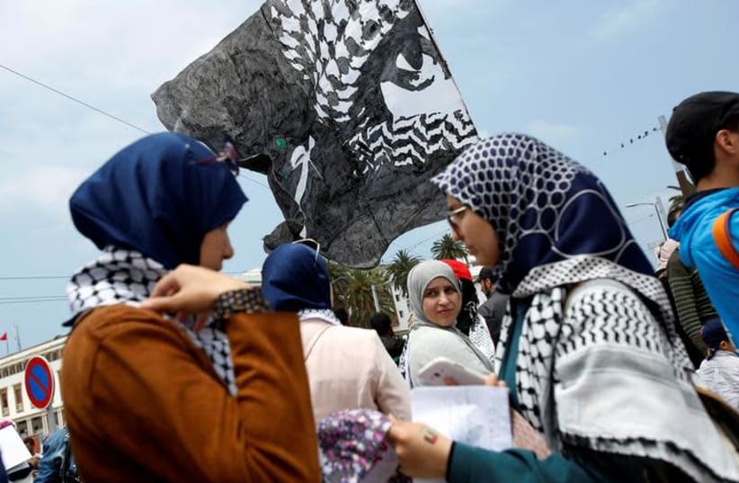 Pro-Palestinian protesters participate in a protest organized by Al Adl wal Ihsane, a Moroccan Islamist association, in solidarity with the Palestinian people, in Casablanca, Morocco May 20, 2018. (photo credit: YOUSSEF BOUDLAL / REUTERS)