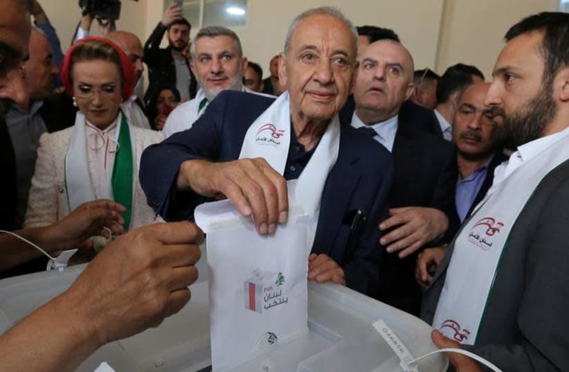 Lebanese Parliament Speaker and candidate for parliamentary election Nabih Berri casts his vote at a polling station during the parliamentary election in Tibnin, South Lebanon, May 6, 2018. (photo credit: AZIZ TAHER/REUTERS)