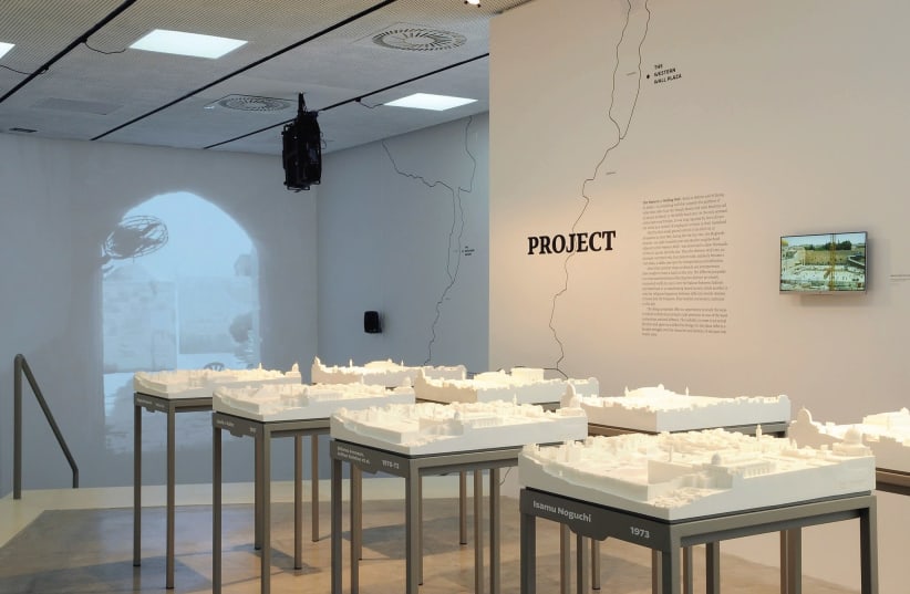 Various Western Wall plaza models (left) and the Holy Sepulchre model are featured at the International Architecture Exhibition in Venice, Italy (photo credit: CLAUDIO FRANZINI/ISRAELI PAVILION)