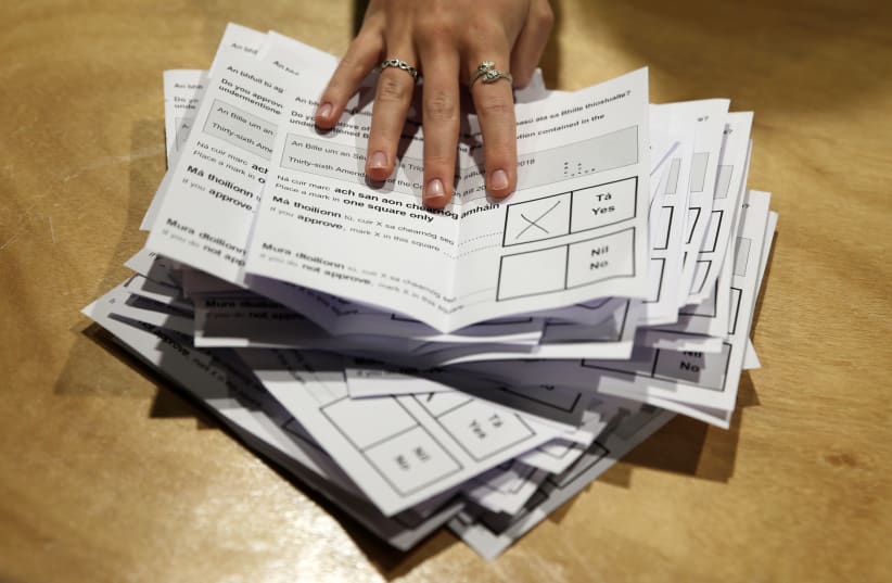 Votes are tallied folowing yesterday's referendum on liberalizing abortion law, in Dublin, Ireland, May 26, 2018 (photo credit: REUTERS/MAX ROSSI)