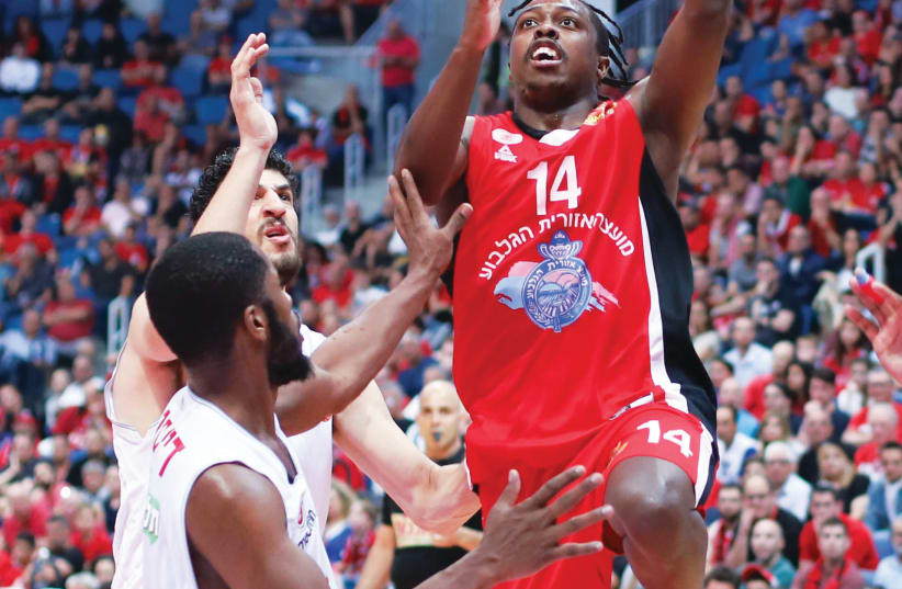 Hapoel Gilboa/Galil guard J’Covan Brown drives to the basket during last night’s 85-78 road win over Hapoel Jerusalem in Game 1 of their BSL quarterfinal series (photo credit: DANNY MARON)