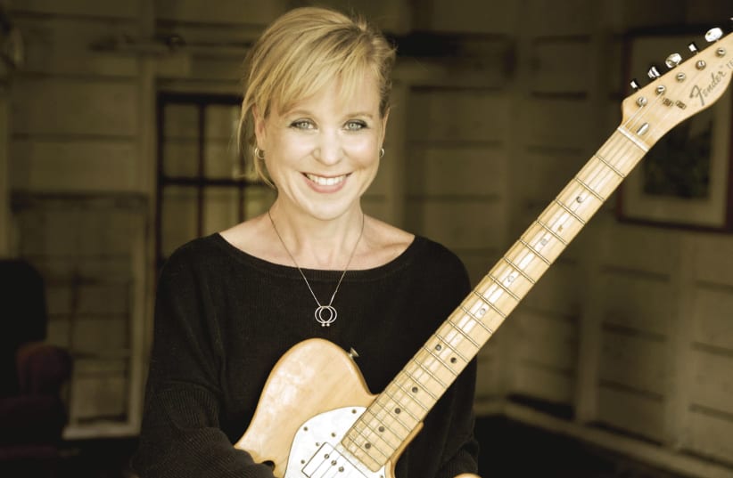 Kristin Hersh: Not caring anymore about the business and only caring about making music (photo credit: PETER MELLEKAS)