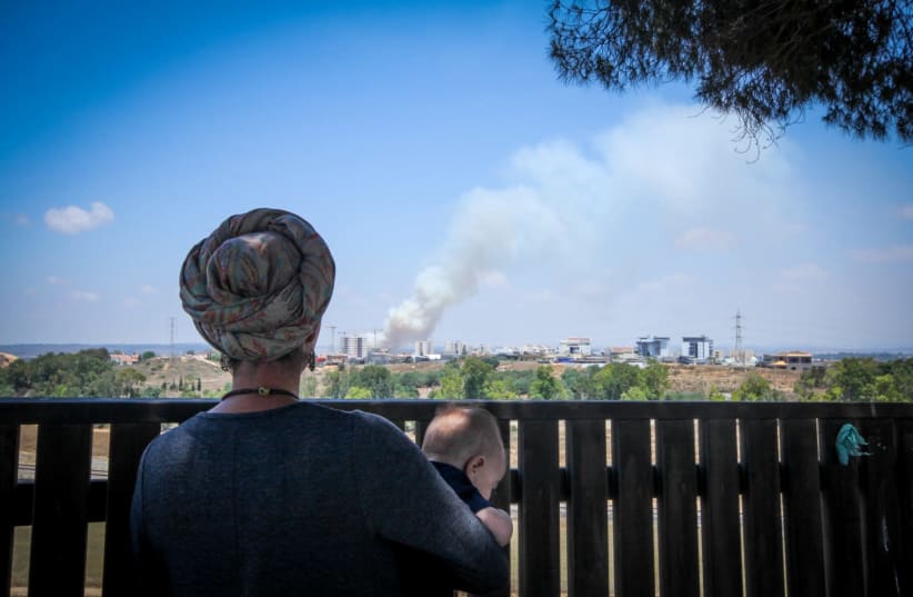 Brushfires rage in southern Israel from incendiary kites launched from Gaza (photo credit: JONATHAN KELLERMAN/TPS)