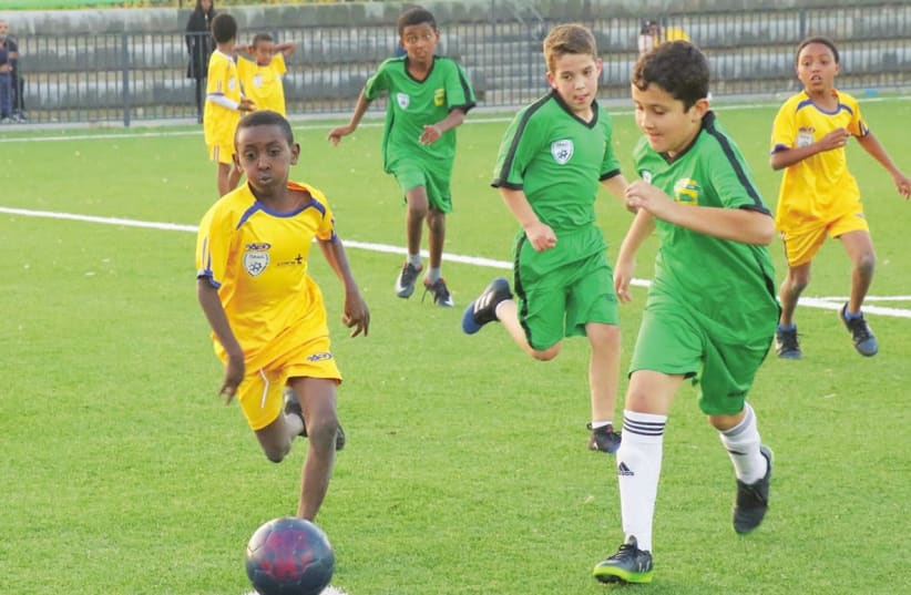 IN ITS ninth year of operation, The Equalizer program brings together Israeli children from different backgrounds through their love of soccer (photo credit: AVIV HAVRON)