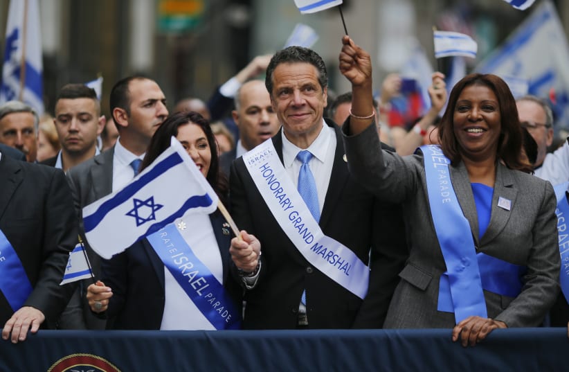 NEW YORK, NY - New York Governor Andrew Cuomo marches during the annual Celebrate Israel Parade on June 3, 2018 in New York City. (photo credit: KENA BETANCUR/GETTY IMAGES/AFP)