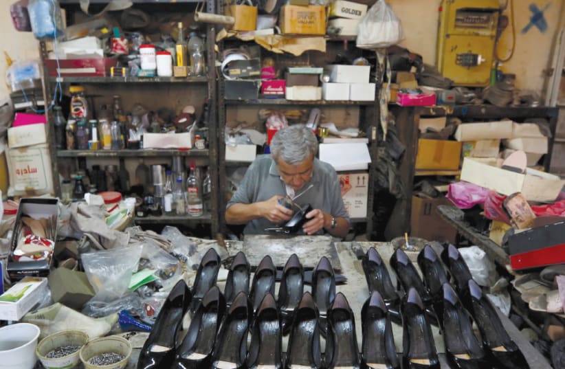 Shoemaker (Illustrative) (photo credit: REUTERS)
