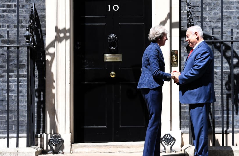 Prime Minister Benjamin Netanyahu meets with British Prime Minister Theresa May in London on Wednesday, June 6, 2018 (photo credit: HAIM ZACH/GPO)