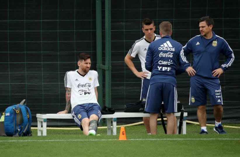 Argentina's Lionel Messi (L) during training for the World Cup, June 2, 2018. (photo credit: ALBERT GEA/ REUTERS)