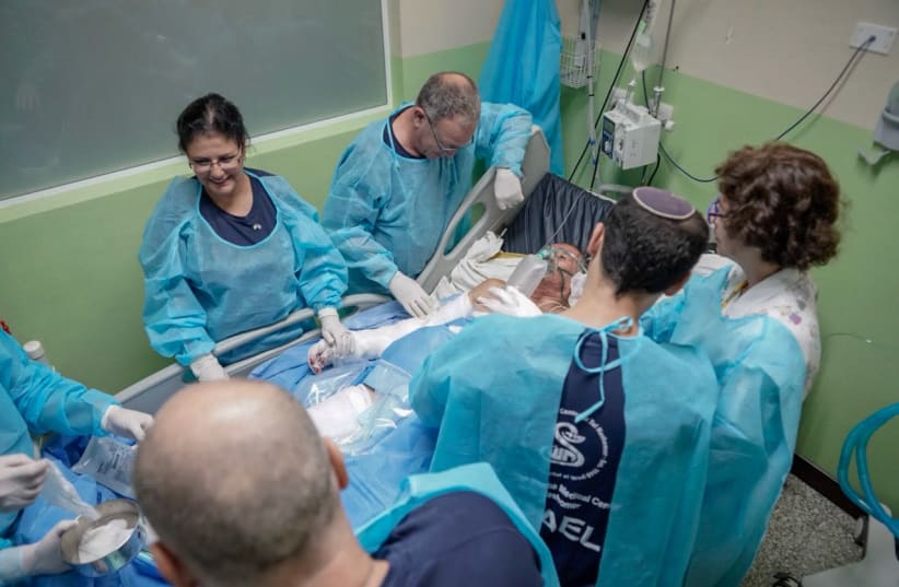THE ISRAELI medical team in Guatemala treats a patient after volcano erupts (photo credit: FOREIGN MINISTRY)