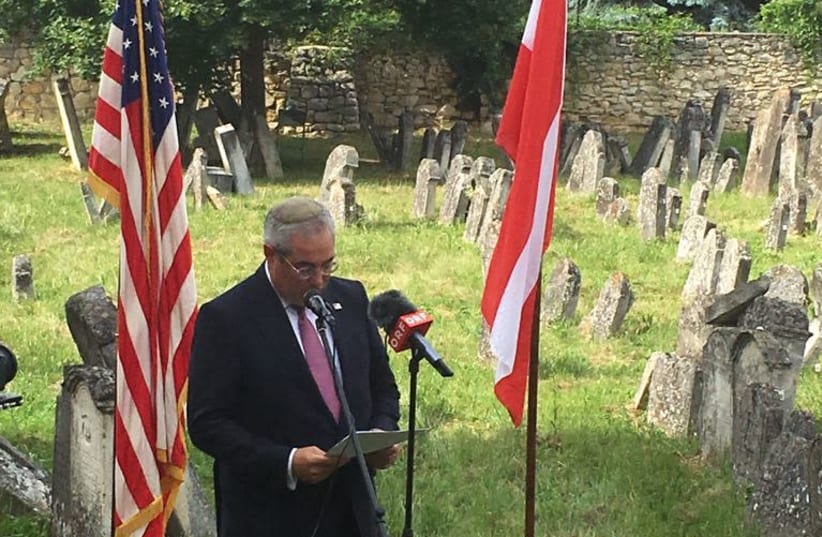 Chairman of the Commission for the Preservation of America's Heritage Abroad Paul Packer speaks at the ceremony on Sunday, June 10, 2018.  (photo credit: Courtesy)