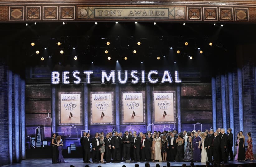 The cast and producers of "The Band's Visit" accept the award for Best Musical on June 10th, 2018 (photo credit: REUTERS/LUCAS JACKSON)