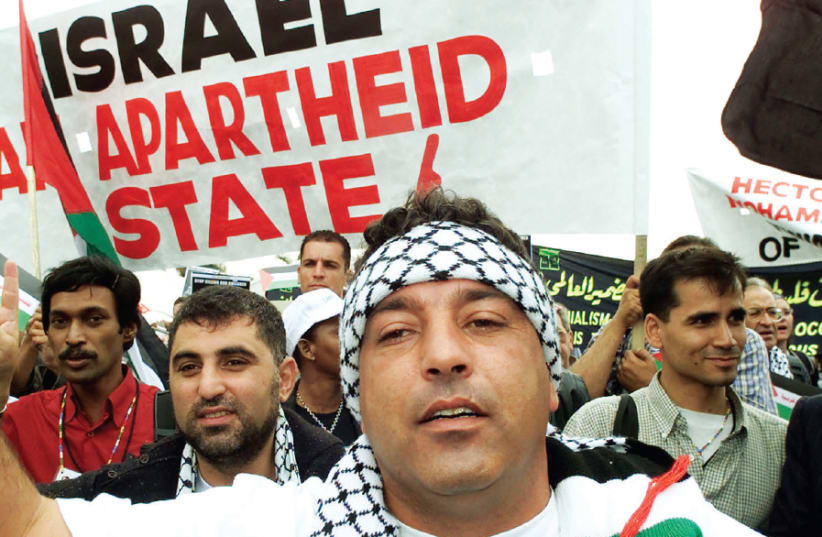  Anti-Israel demonstrators at the World Conference on Racism in Durban, South Africa, in 2001 (photo credit: MIKE HUTCHINGS / REUTERS)