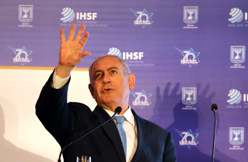 Prime Minister Benjamin Netanyahu gestures as he speaks during the International Homeland Security Forum conference in Jerusalem (photo credit: AMMAR AWAD / REUTERS)