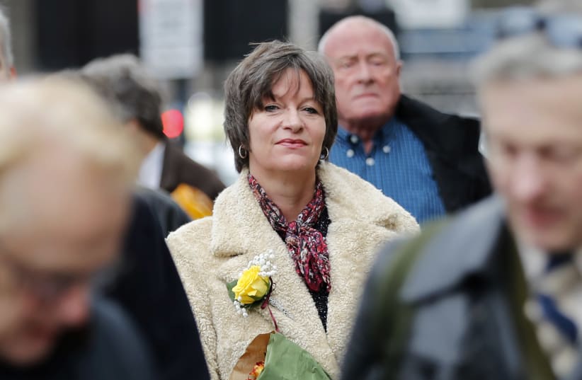 Blogger Alison Chabloz, who is accused of posting anti-semitic songs on her site, arrives at Westminster Magistrate's Court in London on January 10, 2018.  (photo credit: TOLGA AKMEN/AFP)
