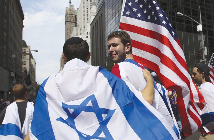 AMERICANS TAKE part in the annual Salute to Israel parade in New York City (photo credit: EDUARDO MUNOZ / REUTERS)