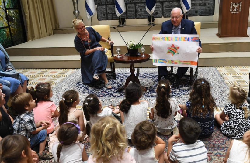 President Reuven Rivlin meets with the children of the Shibolim pre-school at the President's Residence on Tuesday, June 19 (photo credit: HAIM ZACH/GPO)