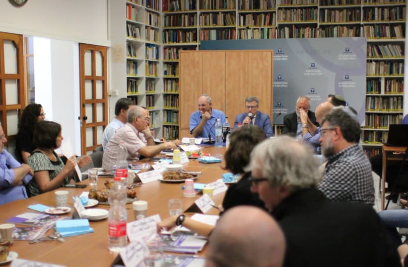 PARTICPANTS IN A roundtable discussion gather this week at the Jerusalem Center for Public Affairs, June 21, 2018.  (photo credit: ROCKY BAIER)