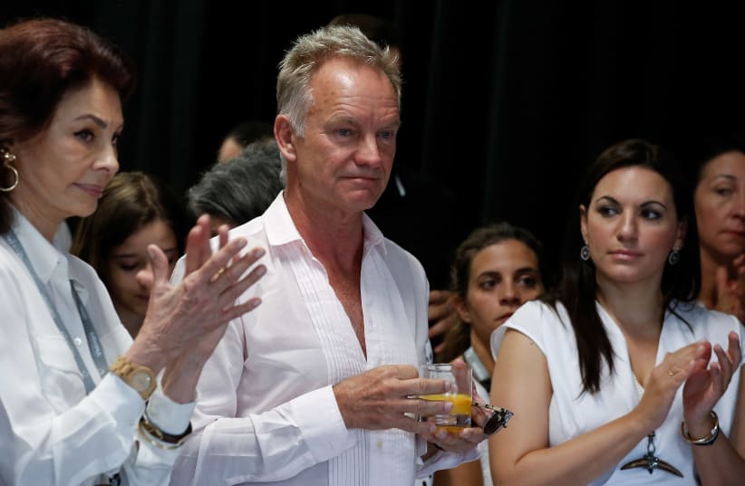 British singer Sting attends an event organized by Amnesty International and the Athens International Airport in Athens, Greece, June 23, 2018.  (photo credit: COSTAS BALTAS / REUTERS)