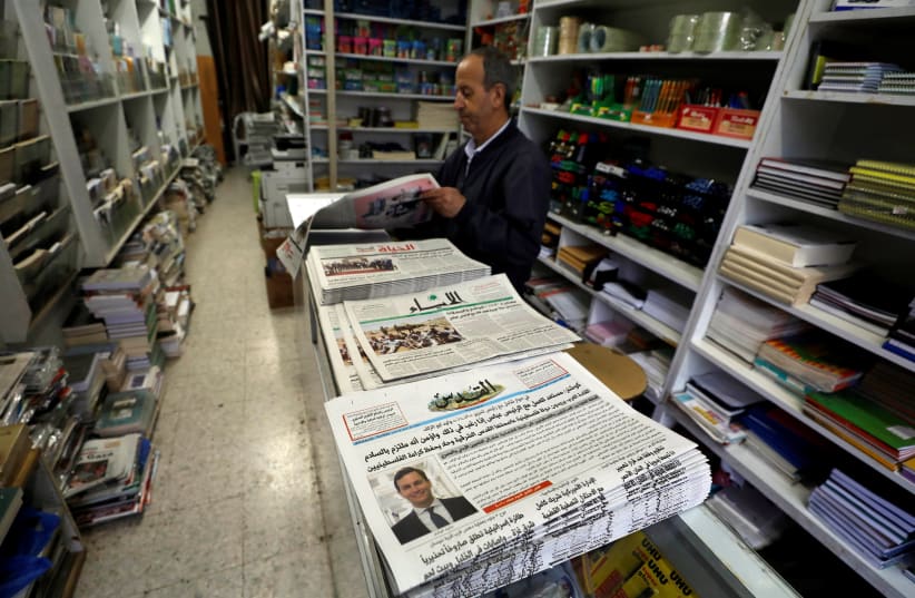 The Palestinian newspaper Al Quds that published an interview with Jared Kushner, U.S. President Donald Trump's senior adviser, is displayed for sale in a bookshop in Ramallah in the occupied West Bank, June 24, 2018. (photo credit: MOHAMAD TOROKMAN/REUTERS)