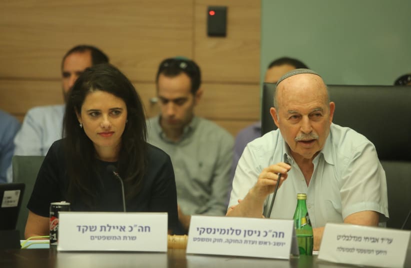 Justice Minister Ayelet Shaked and Knesset Member Nissan Slomiansky debate in a ministerial committee meeting on Monday, June 25, 2018 (photo credit: MARC ISRAEL SELLEM)