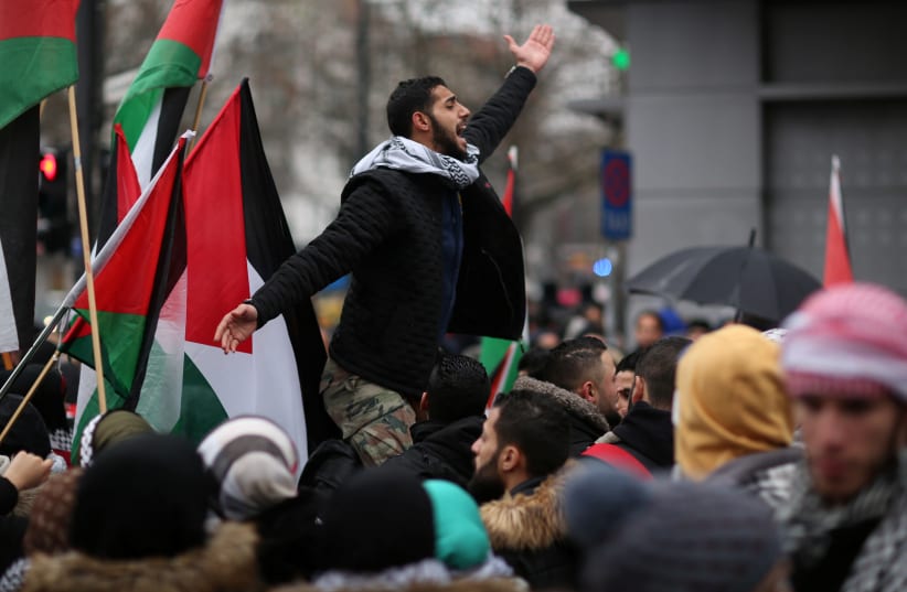 Anti-Trump protesters march in Berlin against the US President’s decision to recognise Jerusalem as Israel's capital, December 15, 2017. (photo credit: REUTERS)
