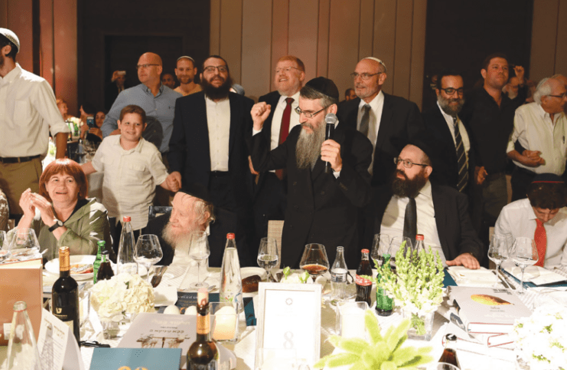 Avraham Fried sings for Rabbi Steinsaltz at the gala dinner in his honor on June 10 (photo credit: ISRAEL BARDUGO)