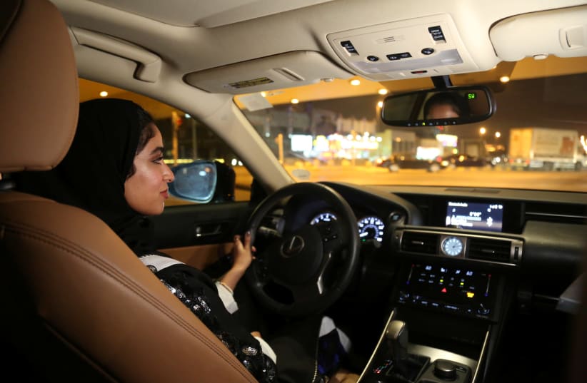 Majdooleen, who is among the first Saudi women allowed to drive in Saudi Arabia, drives her car in her neighborhood in Riyadh, Saudi Arabia June 24, 2018.  (photo credit: REUTERS/SARAH DADOUCH)