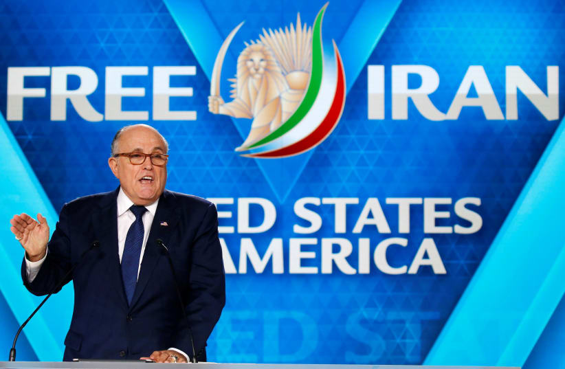 Rudy Giuliani, former Mayor of New York City, delivers his speech as he attends the National Council of Resistance of Iran (NCRI), meeting in Villepinte, near Paris, France, June 30, 2018 (photo credit: REUTERS/REGIS DUVIGNAU)