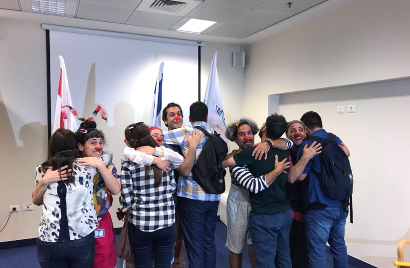 Yazidi Participants learn medical clowning (photo credit: FOREIGN MINISTRY)