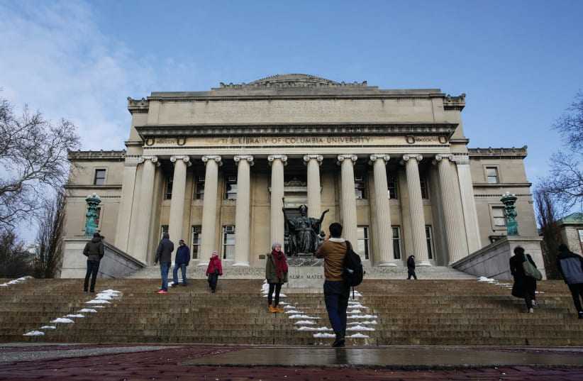 CONNECT WITH them. Students walk outside the Library of Columbia University in New York. (photo credit: REUTERS)