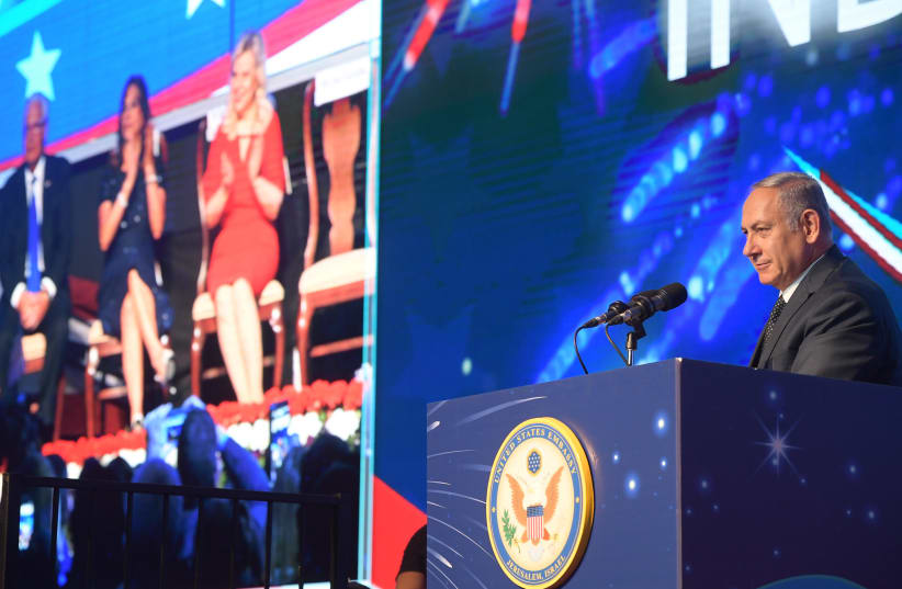 Prime Minister Benjamin Netanyahu speaks at an American Independence Day reception, July 3, 2018 (photo credit: AMOS BEN-GERSHOM/GPO)