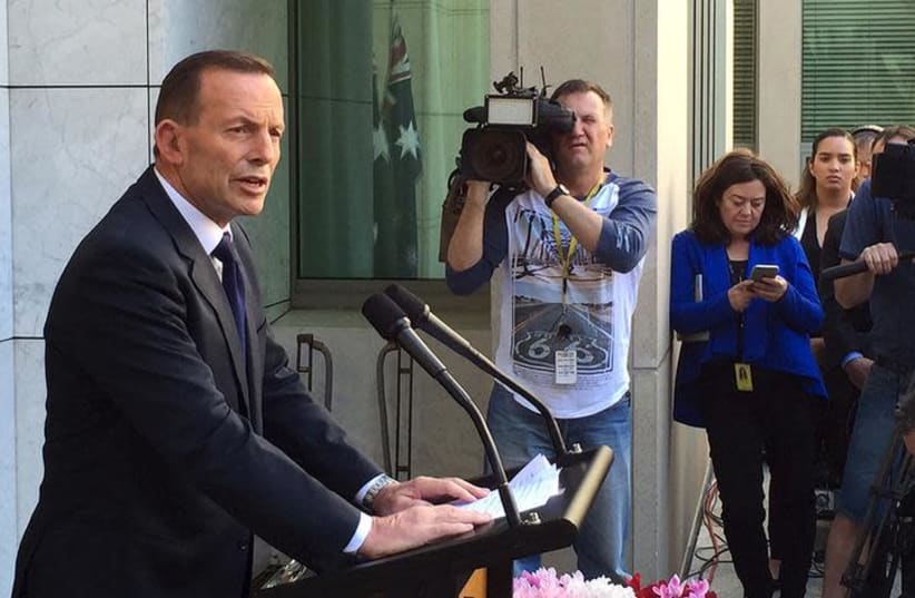 Former Australian Prime Minister Tony Abbott speaks to the media at Parliament House in Canberra, September 15, 2015. (photo credit: REUTERS/MATT SIEGEL)