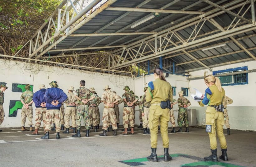 THESE SOLDIERS are being trained to become Military Police correction officers. (photo credit: IDF)