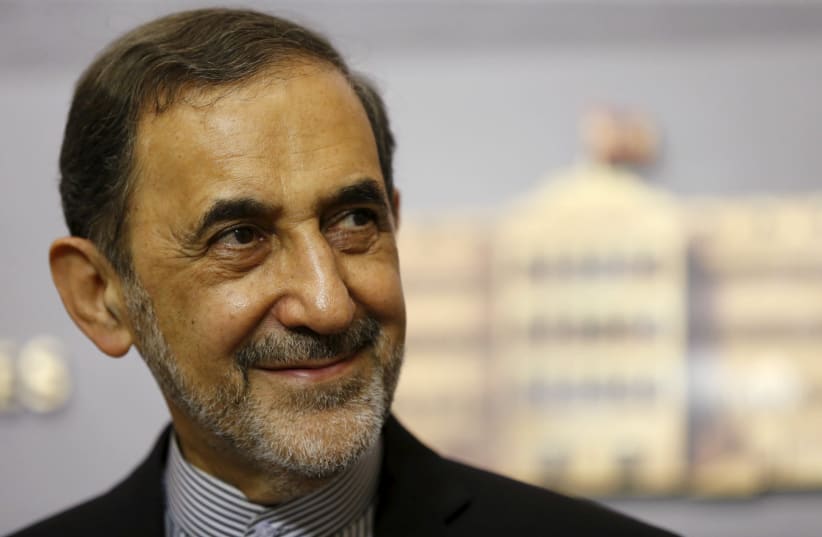 Ali Akbar Velayati, Iran's Supreme Leader Ayatollah Ali Khamenei's top adviser on international affairs, smiles as he listens to questions from the media during a news conference after meeting with Lebanon's Prime Minister Tammam Salam at the government palace in Beirut May 18, 2015.  (photo credit: MOHAMED AZAKIR / REUTERS)