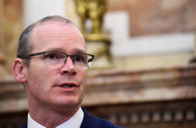 Ireland's Foreign Minister Simon Coveney speaks during a news conference in Dublin, Ireland, April 12, 2018. (photo credit: CLODAGH KILCOYNE/REUTERS)