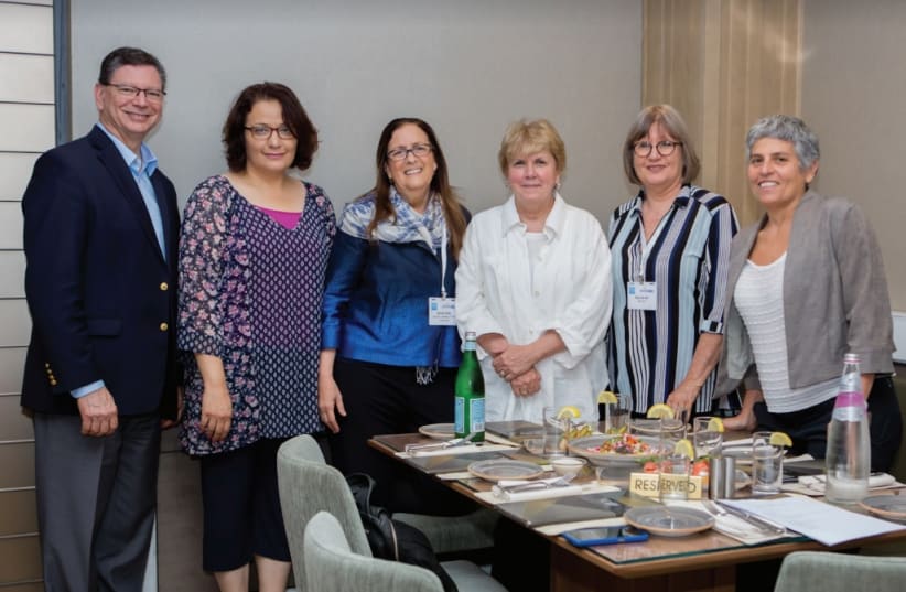 (LEFT TO right) Steven A. Rakitt, president of The Genesis Prize Foundation; Samah Salaime, founder of Arab Women in the Center; Ahuva Yanai, CEO of Matan-United Way Israel; Jane Holl Lute; Ronit Lev Ari, founder of Beit Ruth – Breaking the Cycle of Violence; and Ella Alkalai, chairwoman of the Isra (photo credit: GENESIS PRIZE FOUNDATION)