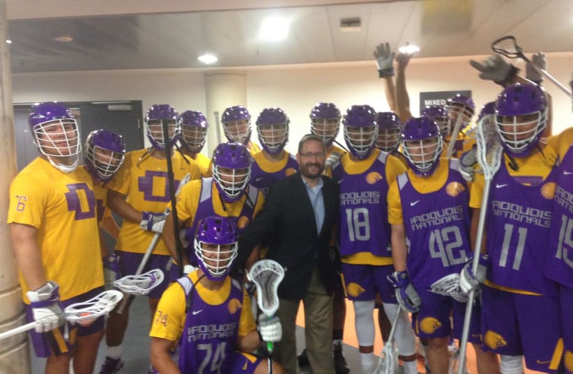 Former MK Dov Lipman poses with the Iroquois Nationals Lacrosse Team at the World Lacrosse Championship (photo credit: Courtesy)