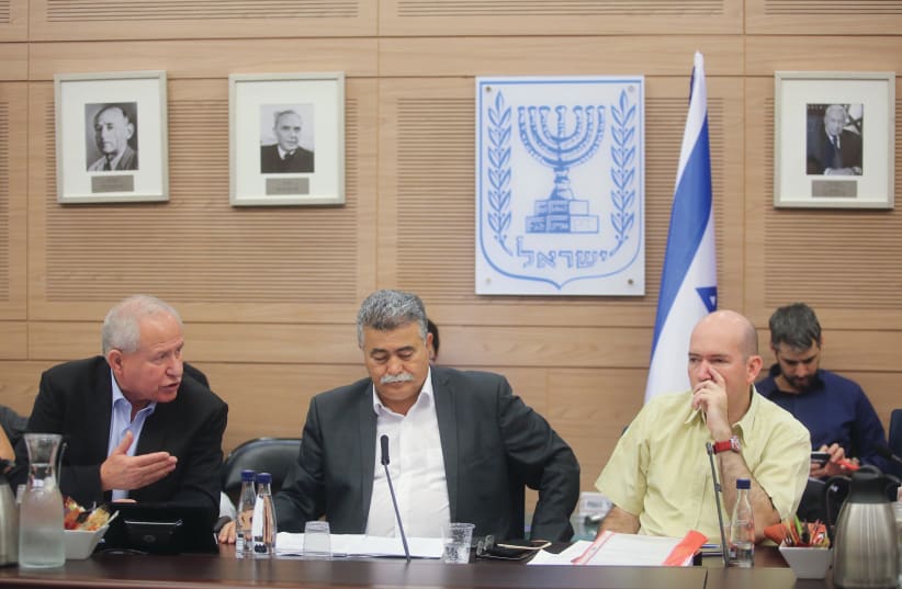 FOREIGN AFFAIRS  and Defense Committee’s  Home-Front Readiness Subcommittee chairman  Amir Peretz (center) hosts a Knesset meeting on Thursday  about the country’s readiness  for earthquakes.   (photo credit: MARC ISRAEL SELLEM)