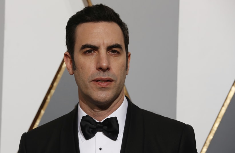 Presenter Sacha Baron Cohen arrives at the 88th Academy Awards in Hollywood (photo credit: ADREES LATIF/REUTERS)