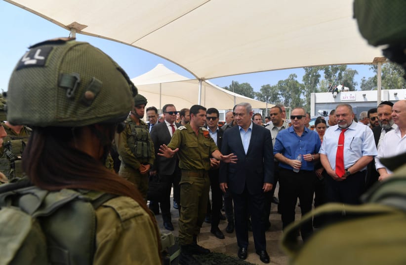 Prime Minister Benjamin Netanyahu and the security cabinet visit Homefront Command, July 16, 2018 (photo credit: KOBI GIDEON/GPO)