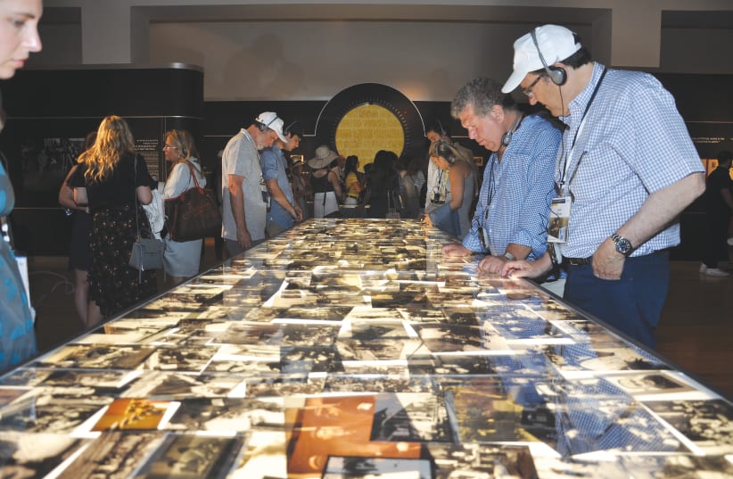 PARTICIPANTS IN the Generation to Generation Mission tour the Flashes of Memory exhibition at Yad Vashem (photo credit: COURTESY YAD VASHEM)
