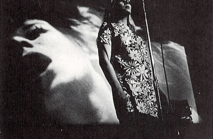 Nico performing with Andy Warhol's Exploding Plastic Inevitable in Ann Arbor, Michigan, 1966 (photo credit: WIKIMEDIA)