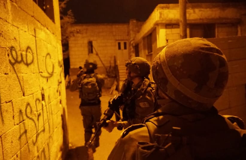 IDF soldiers seen during overnight activity following Thursday's stabbing attack, July 28, 2018 (photo credit: IDF SPOKESPERSON'S UNIT)