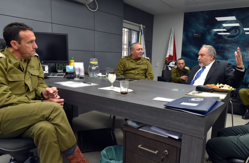 Defense Minister Avigdor Liberman (R) is briefed about the security situation near Gaza, July 29, 2018 (photo credit: ARIEL HERMONI / DEFENSE MINISTRY)