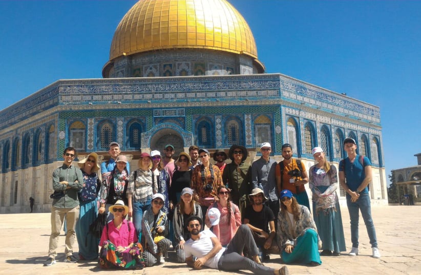 The participants of the 2018 Jerusalem Film Workshop, with the Dome of the Rock in the background (photo credit: Courtesy)