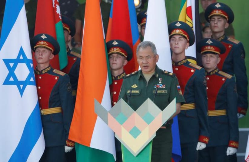 Russian Defense Minister Sergei Shoigu speaks during an opening ceremony of the International Army Games 2018, in Alabino, outside Moscow, Russia, July 28, 2018 (photo credit: REUTERS/SERGEI KARPUKHIN)