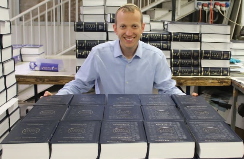 RABBI TULY Weiss poses at the first printing of The Israel Bible (photo credit: Courtesy)