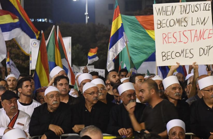 Tens of thousands protest in Tel Aviv along with the Druze against the recently passed Nation-State Law (photo credit: AVSHALOM SASSONI/ MAARIV)