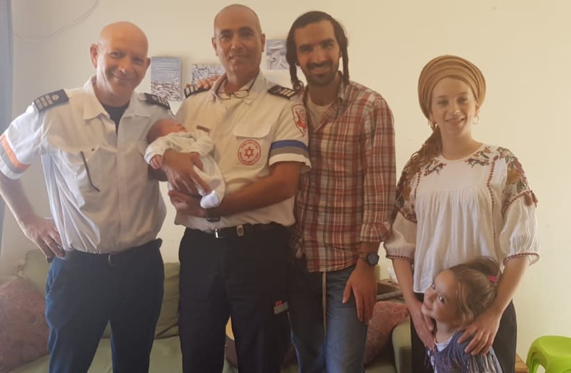 Marsiano family with MDA paramedics after playing guitar in the ambulance (photo credit: MDA)