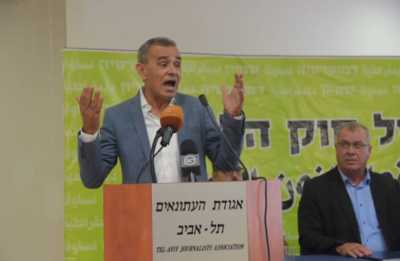 MK Jamal Zahalka speaking at a Tel Aviv press conference against the Nation-State Law, August 7, 2018 (photo credit: AVSHALOM SASSONI/ MAARIV)